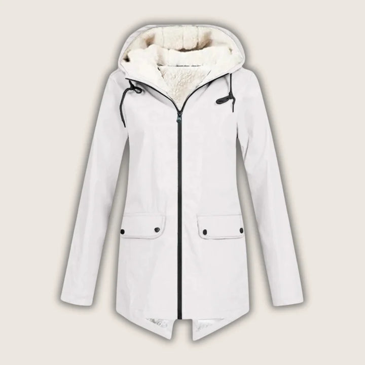 Women's comfortable, waterproof, and hooded jacket featuring convenient front pockets. Ideal stylish outerwear for rain.