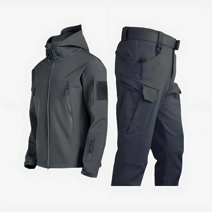Versatile women's waterproof hooded jacket & cargo pants set, perfect for tactical outdoor use & hiking.