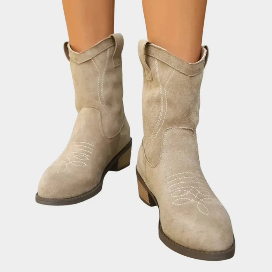 Women's Western-stitch cowboy ankle boots with a block heel, ideal for country style and casual wear.