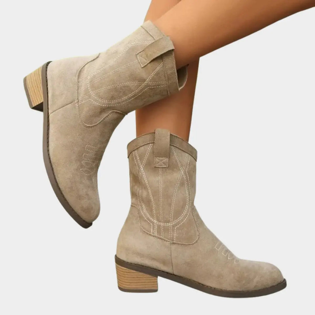 Chic women's Western ankle boots, versatile for daily fashion or adding country flair to any outfit.