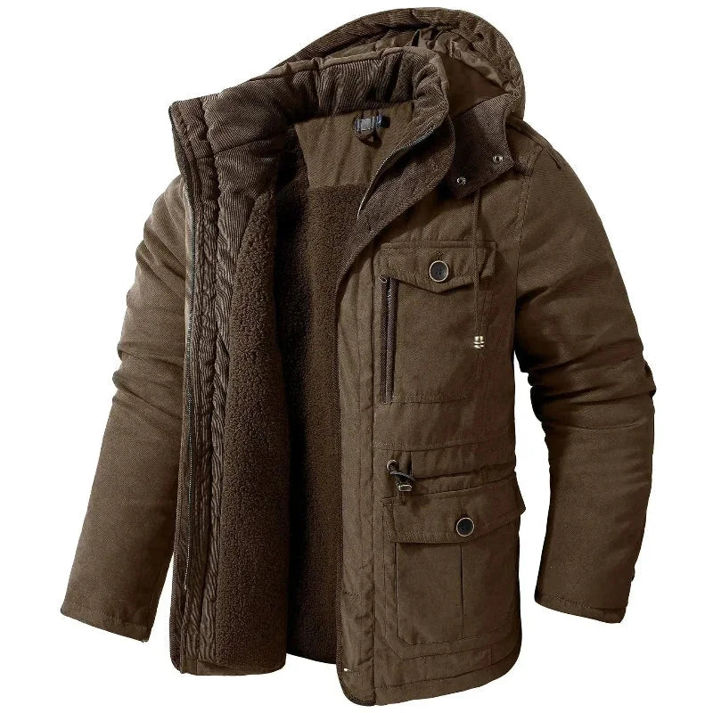 Durable women's utility field jacket, versatile outerwear with a detachable hood, ideal for winter adventures & weather protection.