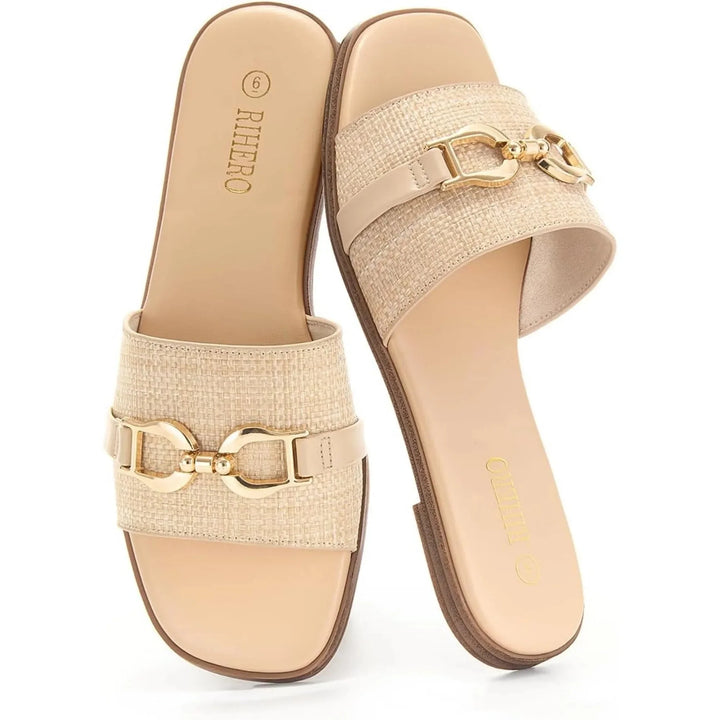 Elegant women's woven slide sandals in beige with a chic buckle. Comfortable flats for everyday summer.