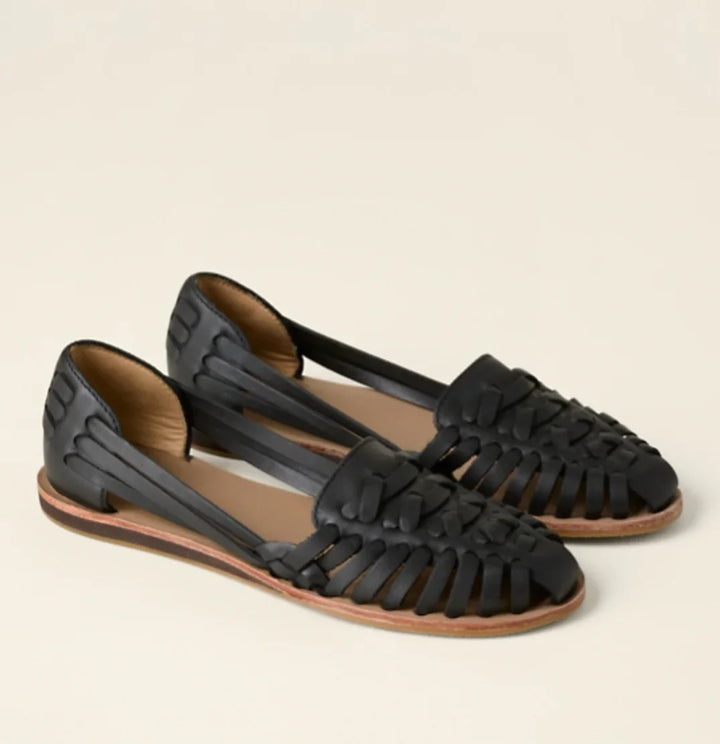 Women's elegant flat D'Orsay sandals with intricate woven detail, perfect for casual summer wear and everyday comfort.