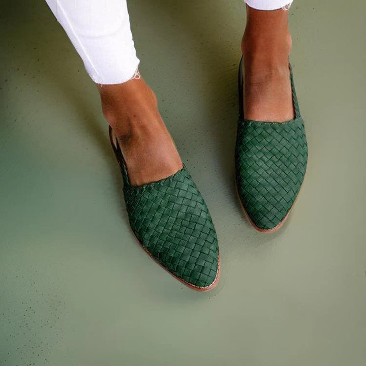 Women's woven leather sandals with slingback, featuring a hand-woven design and cushioned sole for all-day comfort.