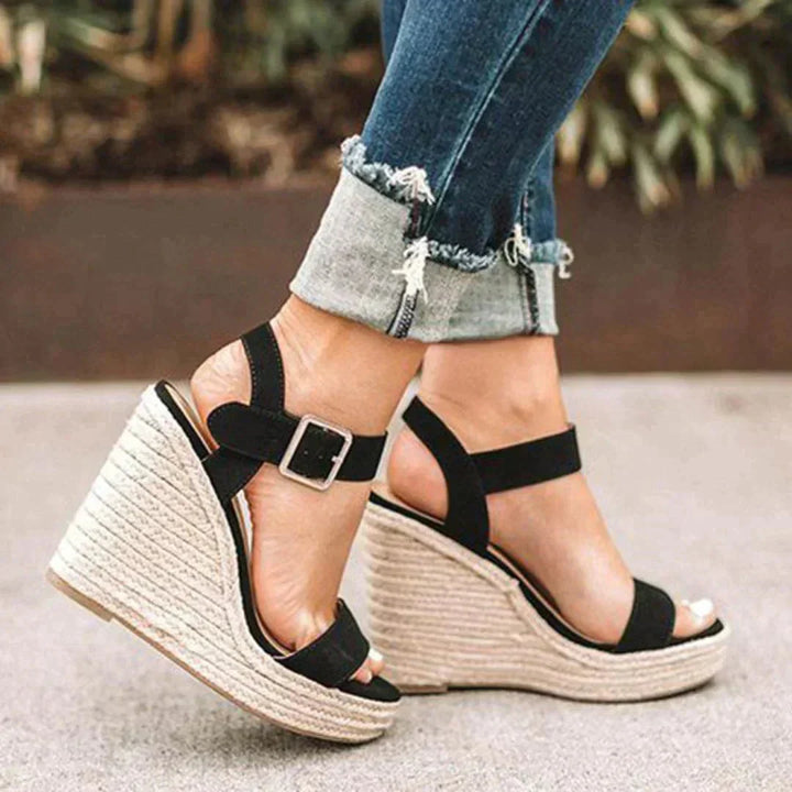 Comfortable women's wedge sandals, open-toe design with secure ankle strap, perfect for elegant summer shoes & everyday wear.