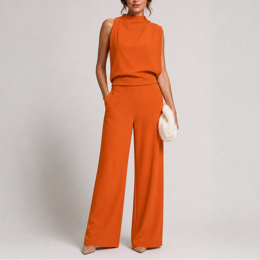 High neck, sleeveless, wide-leg women's jumpsuit. Elegant one-piece for versatile modern fashion and summer chic.