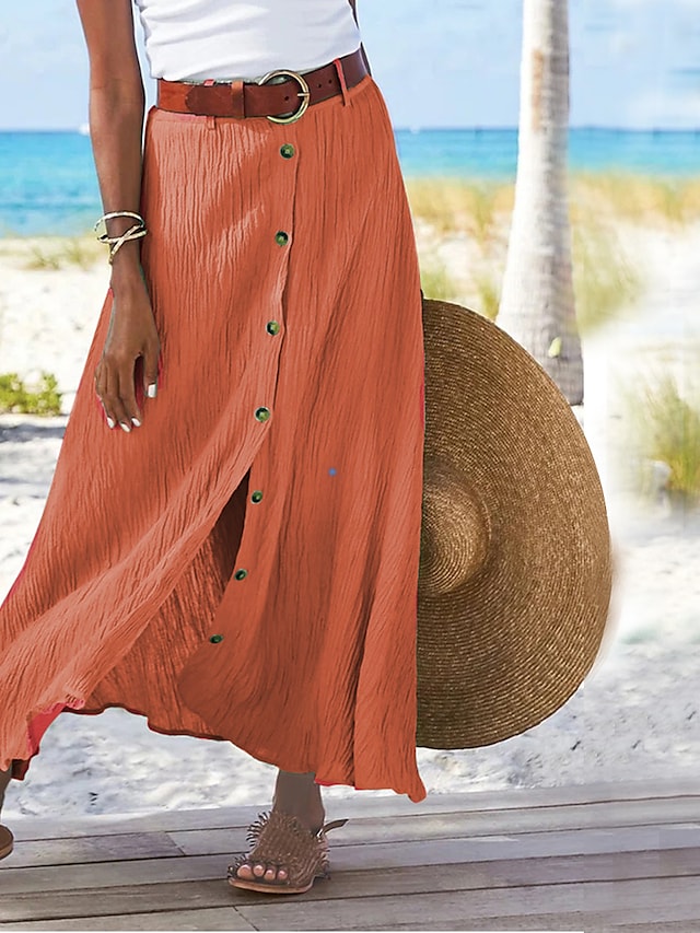 Elegant women's flowy long maxi skirt with a high-waist. Perfect for a chic, comfortable summer style.