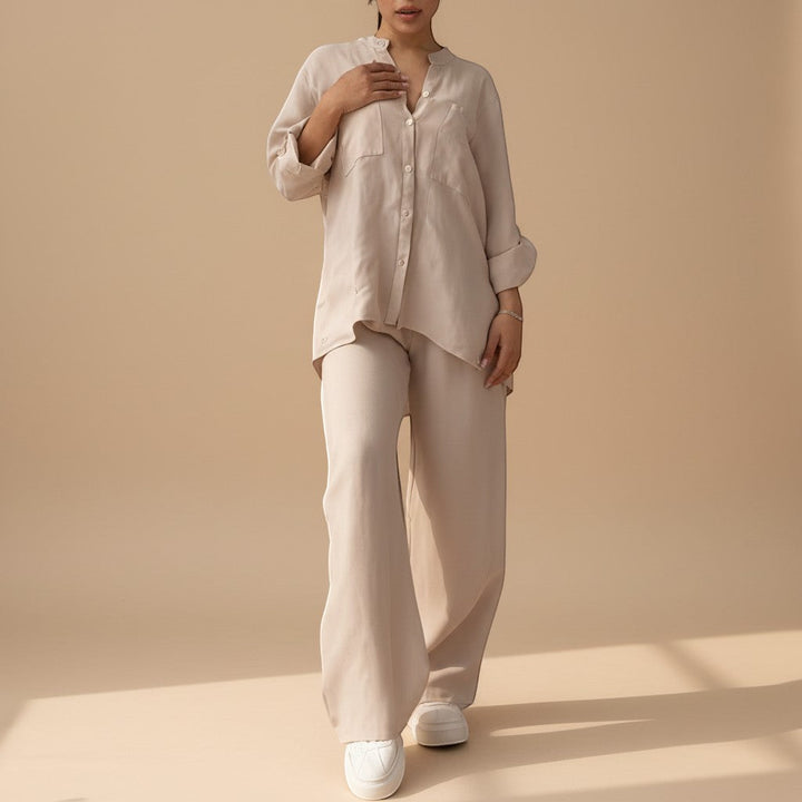 Women's complete relaxed button-down shirt & wide leg pants outfit. Versatile two-piece set.