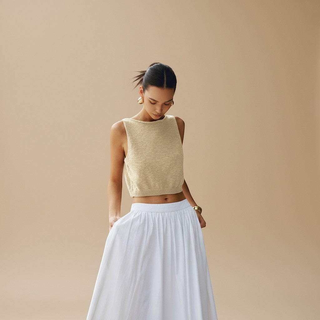 Breathable women's sleeveless high neck crop top, textured for a stylish and cool summer look.