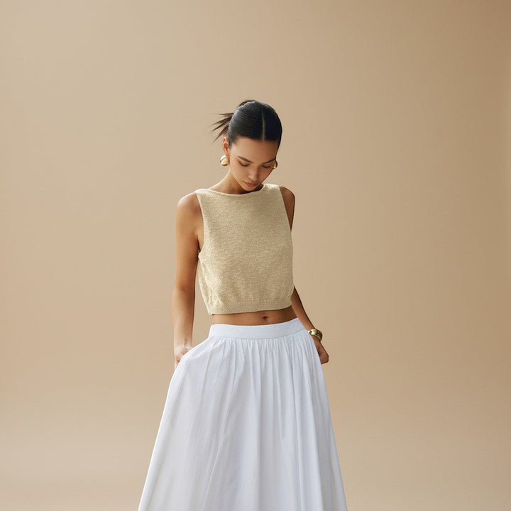 Breathable women's sleeveless high neck crop top, textured for a stylish and cool summer look.