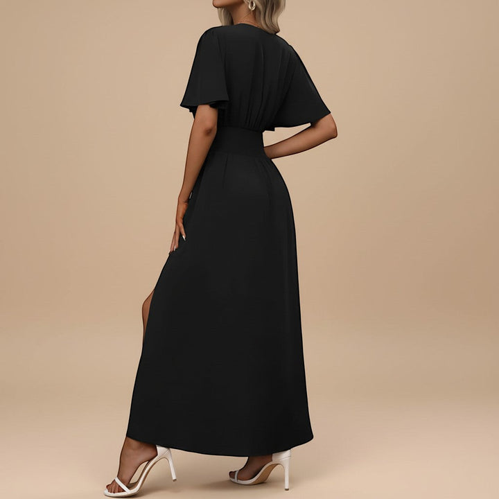 Elegant long maxi dress for women, featuring a V-neck, flutter sleeves, and a flattering defined waist.