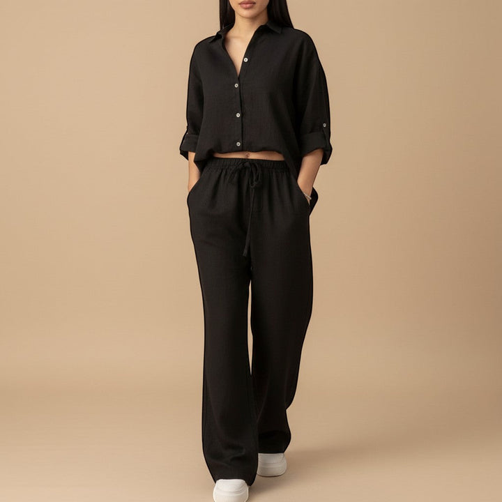 Stylish women's relaxed button-down shirt & wide leg pants set. Chic casual two-piece outfit.