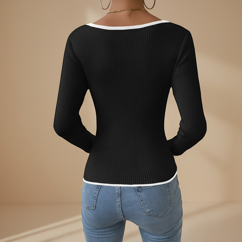 Fitted women's knit long-sleeve V-neck top featuring a chic contrast trim, ideal for modern casual wear.