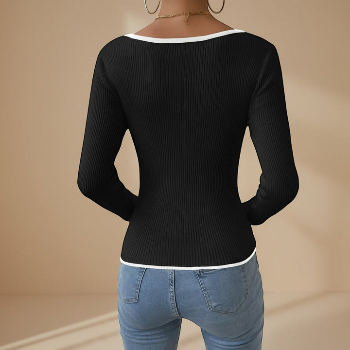 Fitted women's knit long-sleeve V-neck top featuring a chic contrast trim, ideal for modern casual wear.