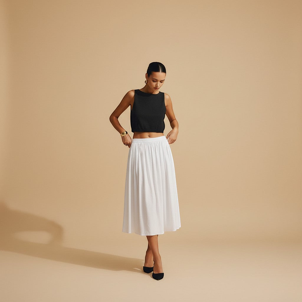 Fashionable women's sleeveless crop top, high neck, perfect for summer versatility & comfort.