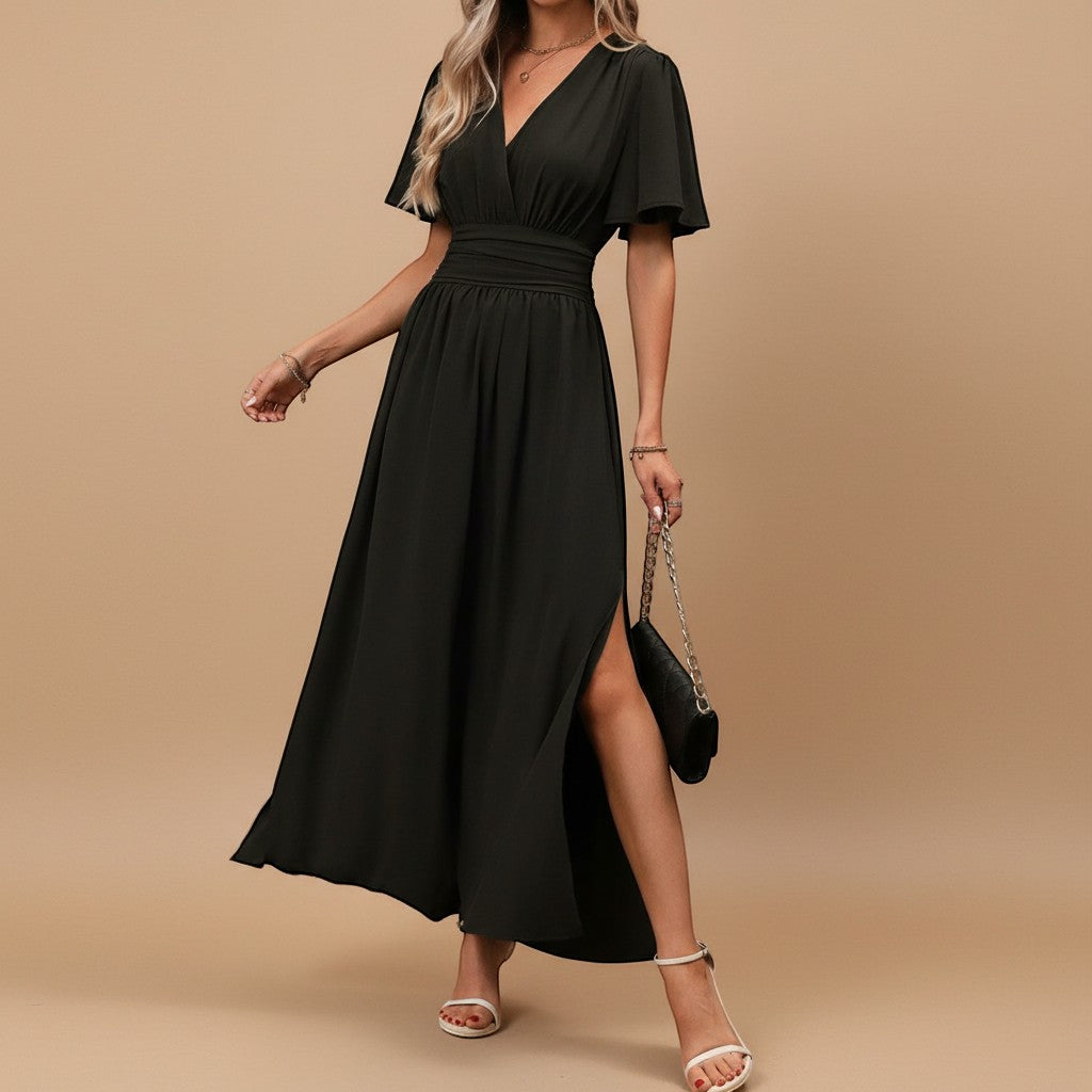 Women's V-neck flutter sleeve maxi dress with defined waist, elegant for special occasions.