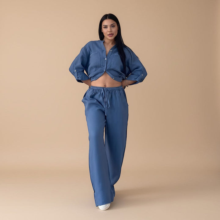 Chic women's casual button-down shirt & wide leg pants set for spring/summer fashion.