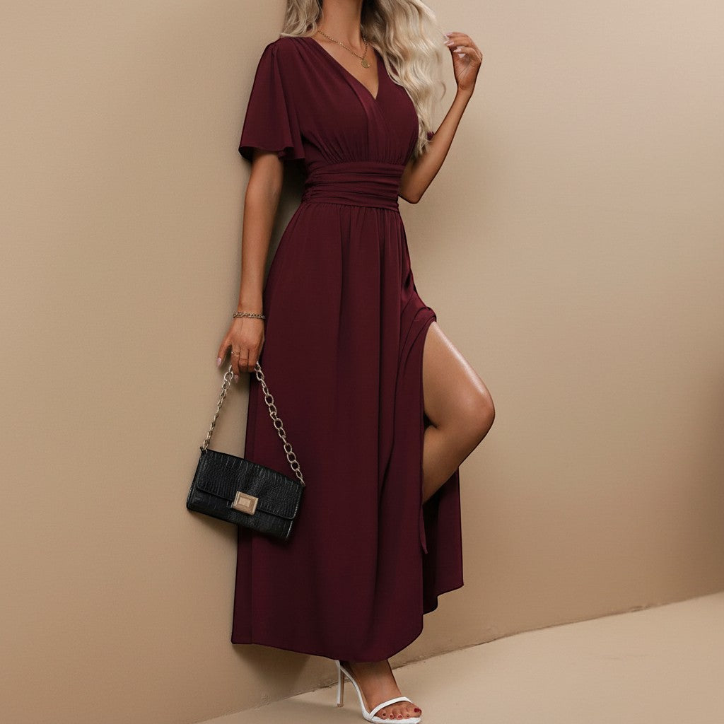 Formal women's evening maxi dress; features V-neck, flutter sleeves, and defined waist for elegant events.