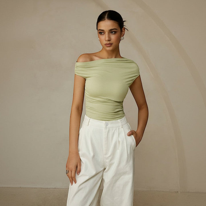 Chic women's one shoulder ruched top, asymmetrical fitted design perfect for evening wear.