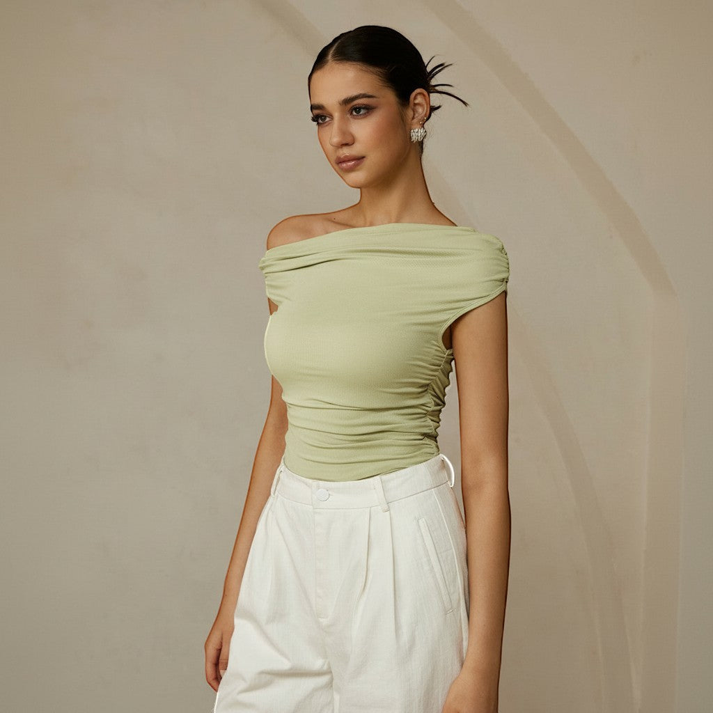 Stylish women's asymmetrical one-shoulder ruched top, ideal for parties and spring/summer events.