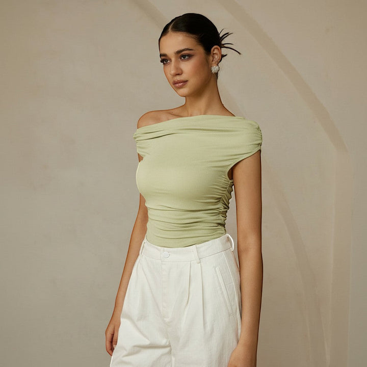 Stylish women's asymmetrical one-shoulder ruched top, ideal for parties and spring/summer events.