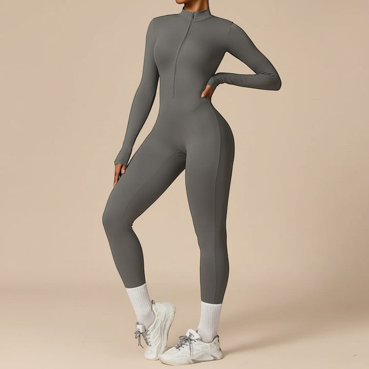Modern full-length women's one-piece jumpsuit with sculpting fit, long sleeves, and a practical zip front closure.