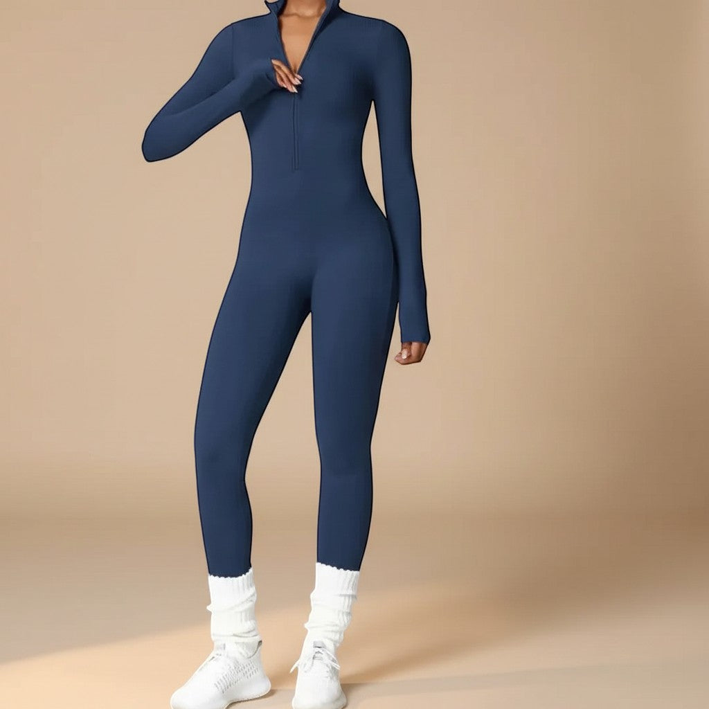 Close-up of the convenient zip front on a sleek, sculpting women's long sleeve jumpsuit, enhancing its modern design.