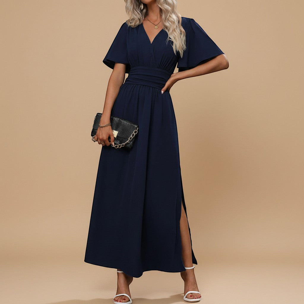Flowy women's V-neck maxi dress with graceful flutter sleeves and a defined waist, ideal for parties.
