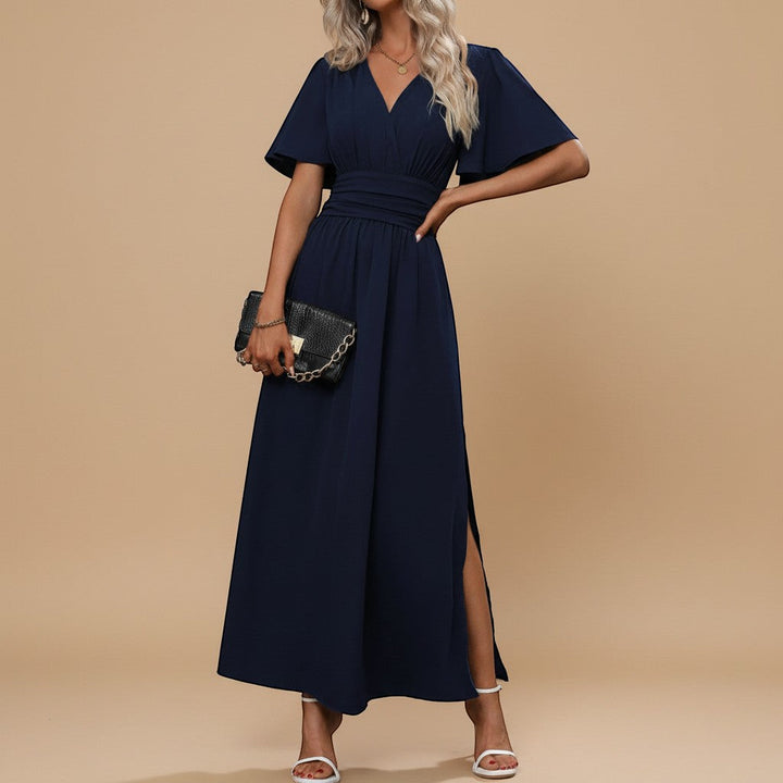 Flowy women's V-neck maxi dress with graceful flutter sleeves and a defined waist, ideal for parties.