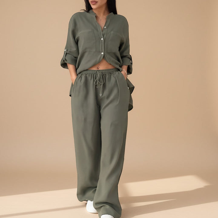 Women's stylish wide-leg pants & relaxed button-down shirt matching set. Summer fashion.