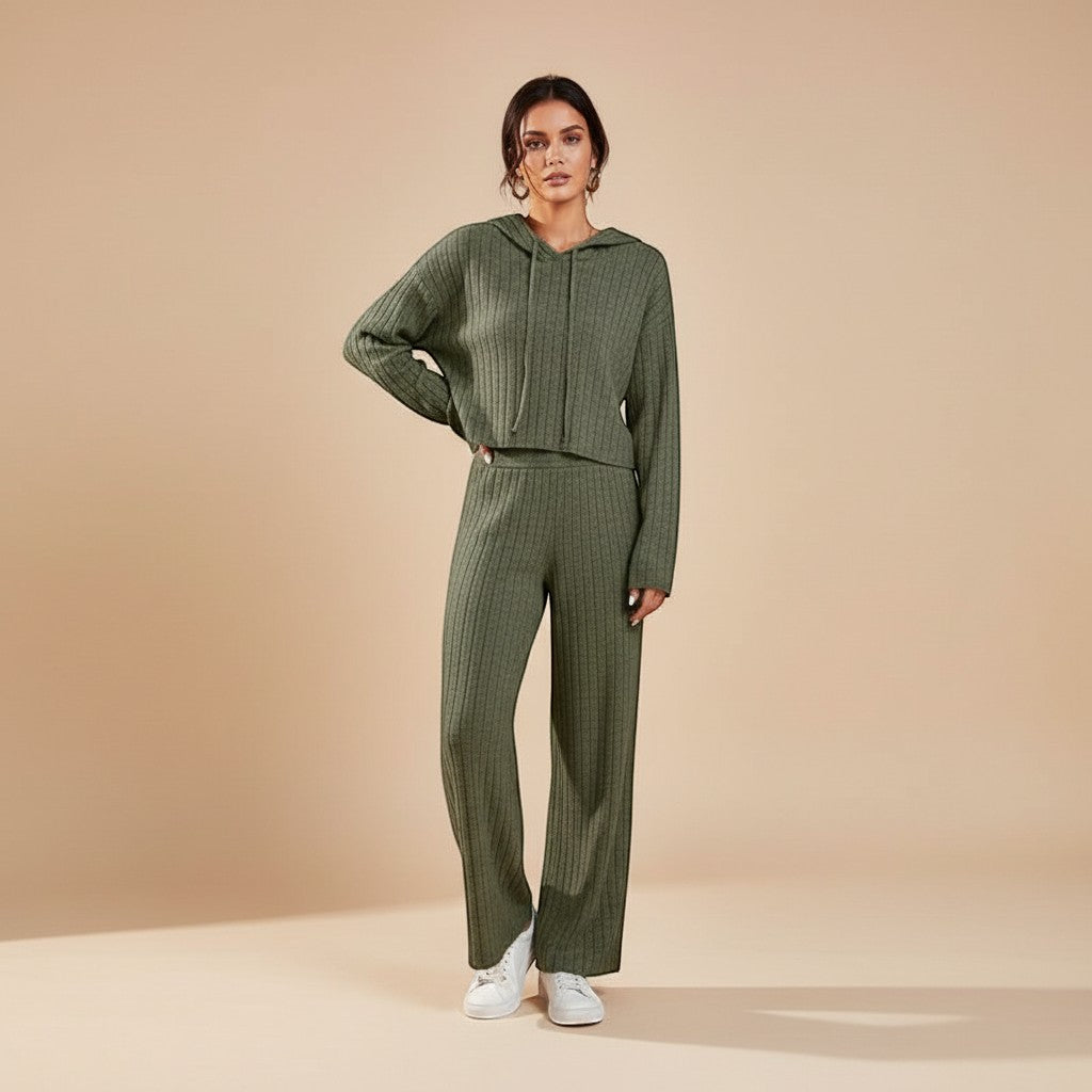 Women's ribbed loungewear set featuring a cozy hoodie & relaxed straight-leg pants, perfect for home or travel comfort.