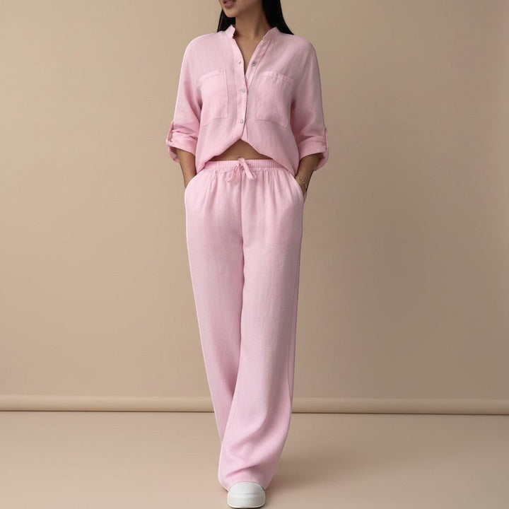 Modern women's casual button-down shirt and wide-leg pants matching set. Relaxed spring style.