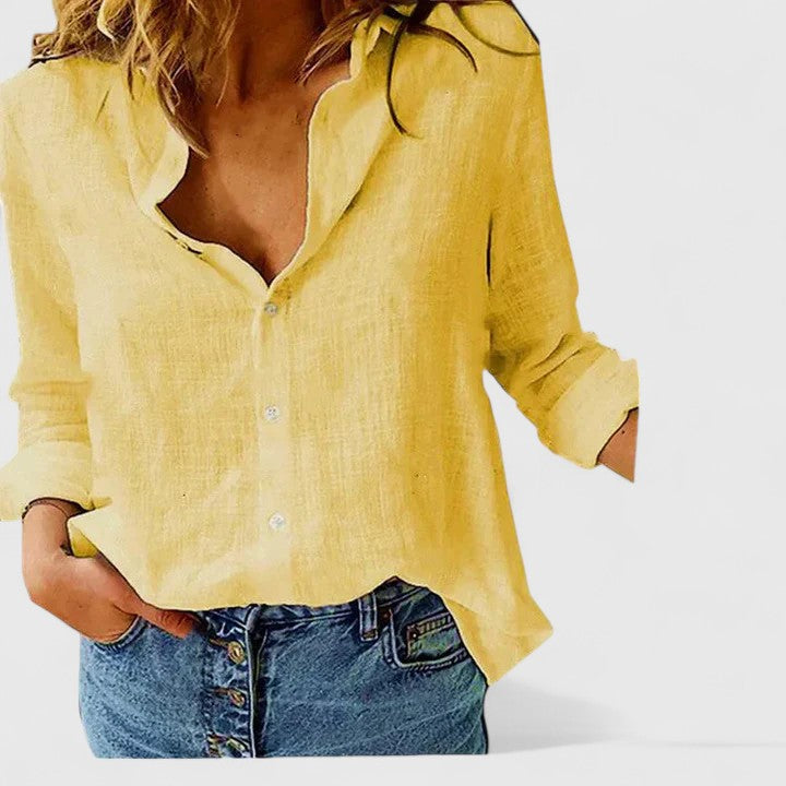 Smart women's elegant button-down blouse, versatile for all occasions, perfect for casual or office wear.