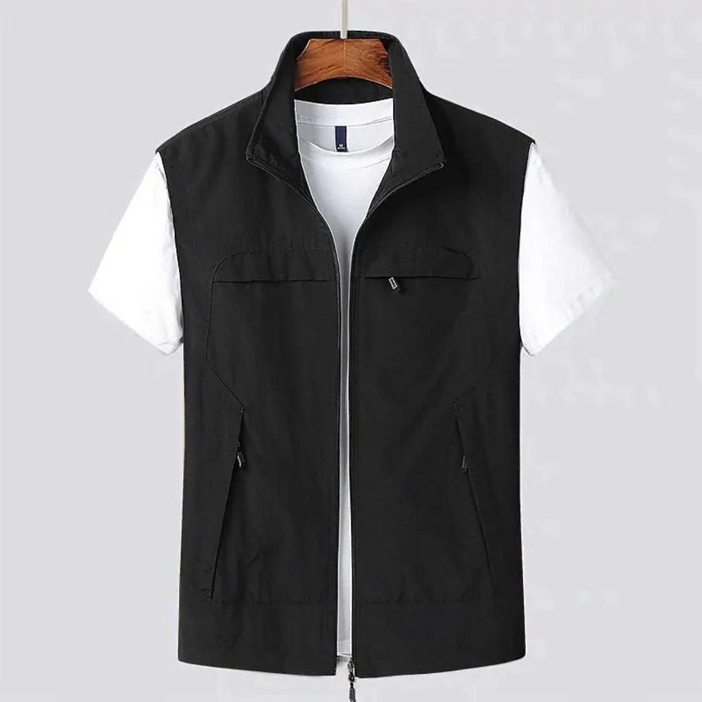 Active men's sleeveless vest for outdoor adventures. Quick-dry fabric and functional design for summer and travel.