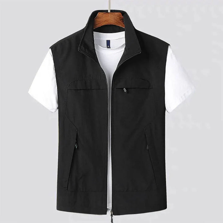 Active men's sleeveless vest for outdoor adventures. Quick-dry fabric and functional design for summer and travel.