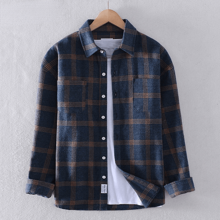 Men's classic checkered button-down shirt. Long sleeve, relaxed fit, versatile for casual everyday men's fashion.