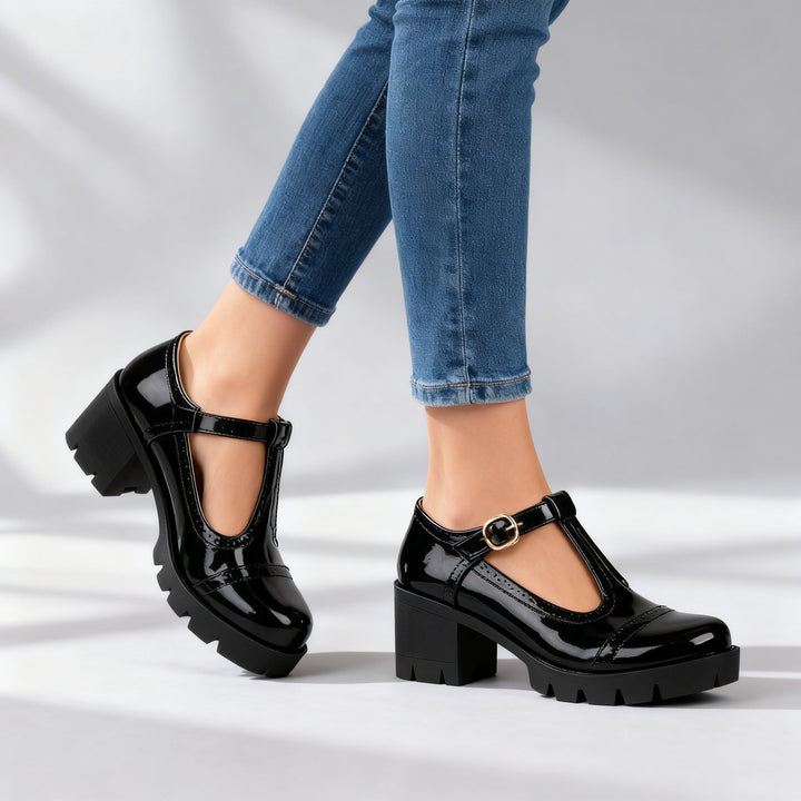 Sophisticated women's classic Mary Jane heels. T-bar strap, sturdy block heel. Ideal for elegant professional wear.