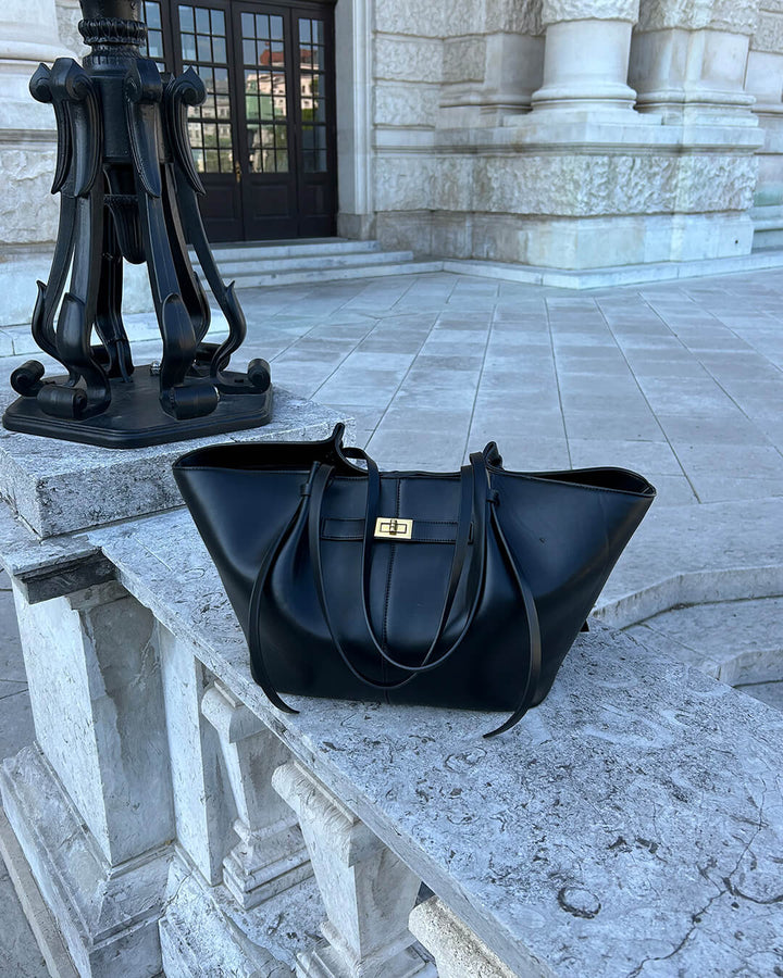 Women's structured handbag, an elegant shopper with sophisticated gold embellishments. Versatile everyday tote.
