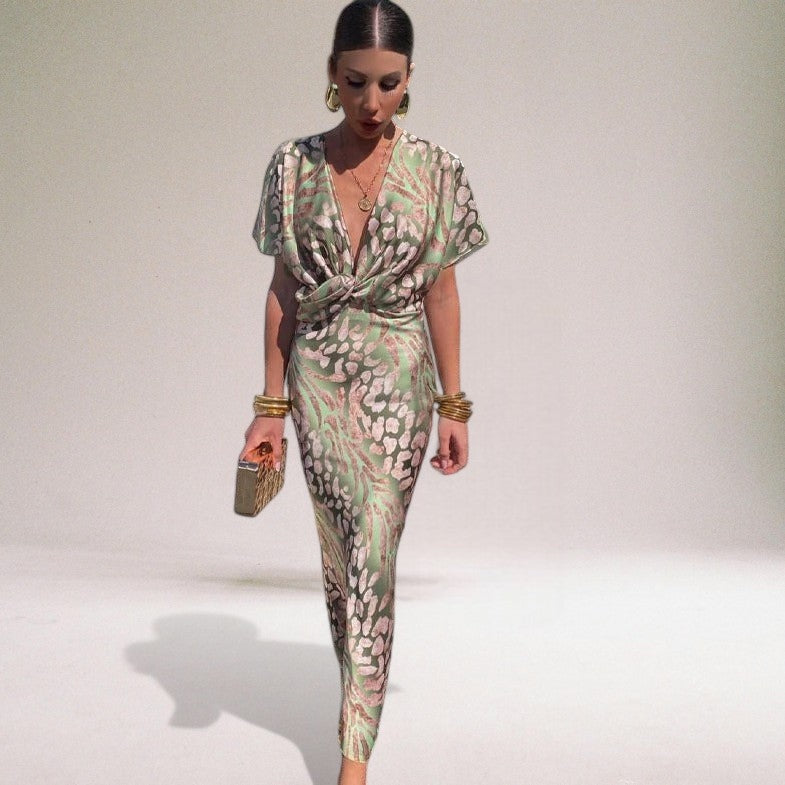 Long formal wrap maxi dress for women, ideal for special occasion or wedding guest. Elegant v-neck, cinched waist.