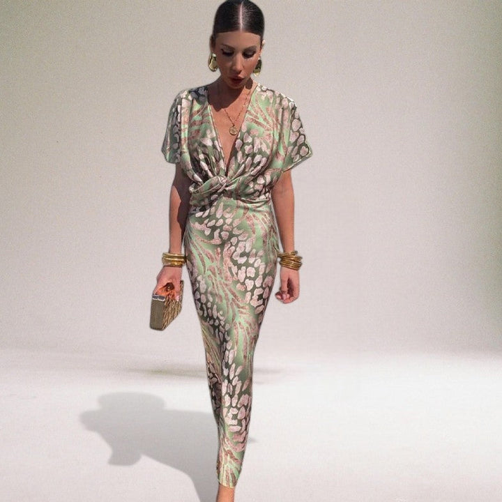 Long formal wrap maxi dress for women, ideal for special occasion or wedding guest. Elegant v-neck, cinched waist.