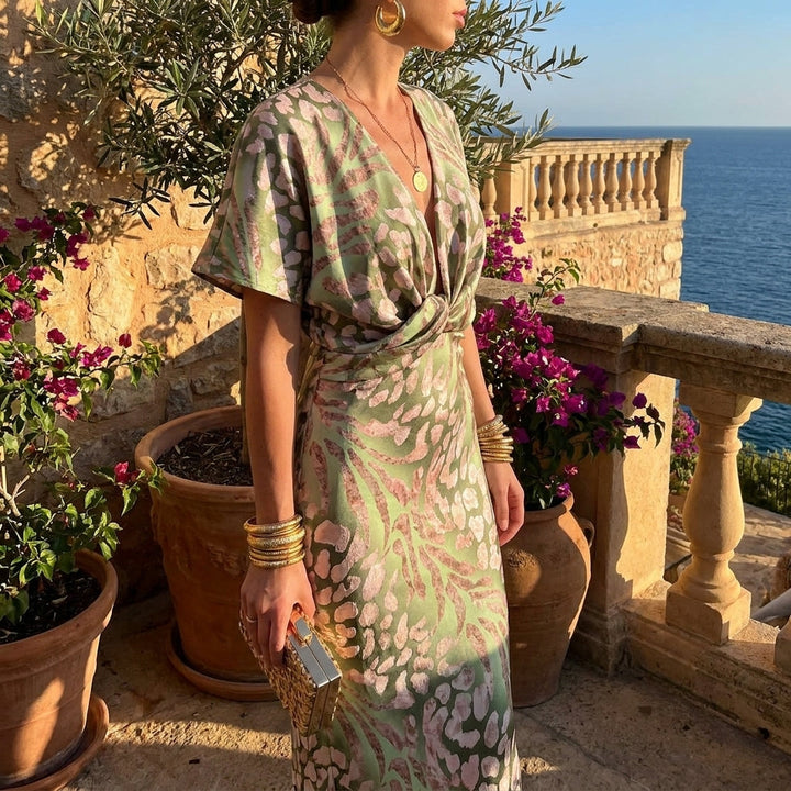 Elegant women's maxi dress, perfect for wedding guests. Features a v-neck, wrap style, and cinched waist. Formal evening wear.