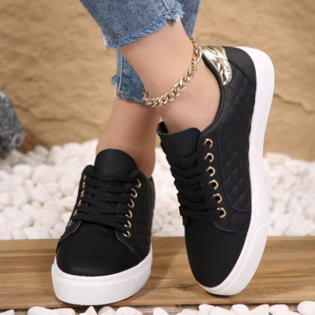 Pair of women's comfort walking shoes, engineered to provide effective pain relief and foot support for active women.