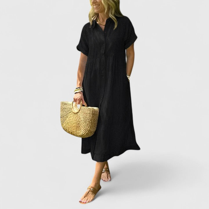 Everyday women's midi dress with elegant vertical stripes, comfortable and flattering for a versatile look.